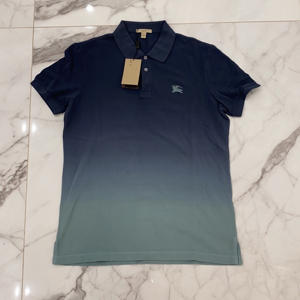 Brand new with tags Burberry polo size large gradient dark blue light blue